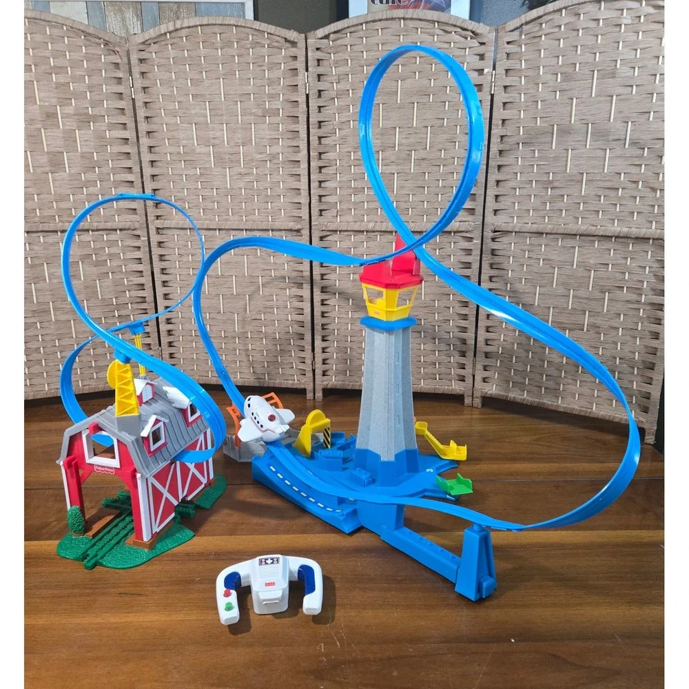 Fisher-Price GeoTrax Breakthrough Barn and High-Flying Airport RC Plane Bundle